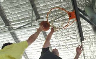 Alley-oop: Players and spectators get ready for Sawtell’s charity two-on-two basketball competition tomorrow. Alley-oop: Players and spectators get ready for Sawtell’s charity two-on-two basketball competition tomorrow.